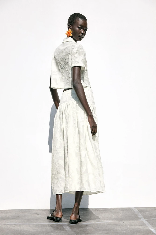 JUPE MIDI TEXTURÉE