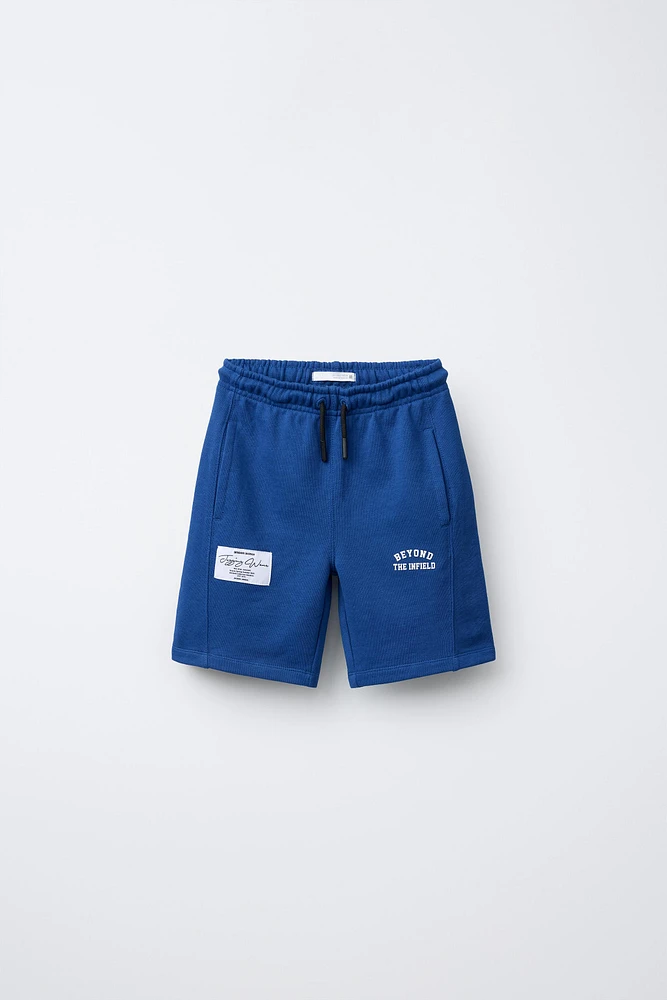 BERMUDA DE JOGGING ÉTIQUETTE