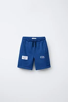 BERMUDA DE JOGGING ÉTIQUETTE