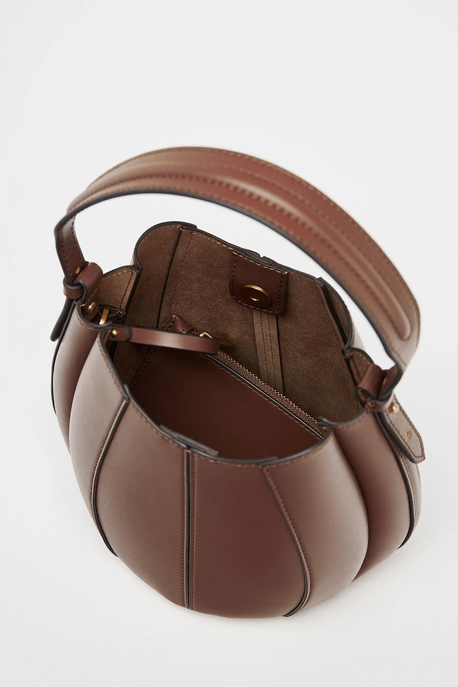 TOPSTITCHED BUCKET BAG