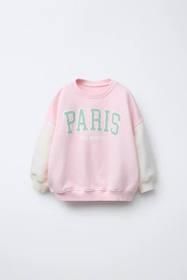 RAISED TEXT PRINT SWEATSHIRT