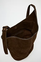 ASYMMETRIC SOFT SPLIT LEATHER BUCKET BAG