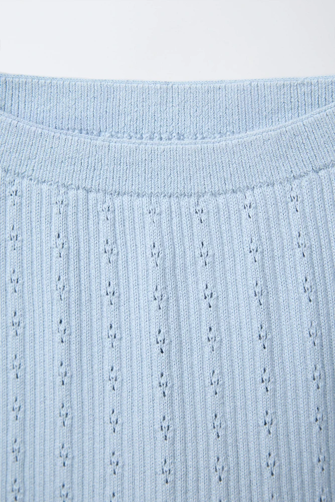 PANTALON EN MAILLE AJOURÉ