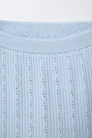 PANTALON EN MAILLE AJOURÉ