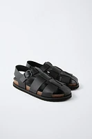 LEATHER CAGE SANDALS