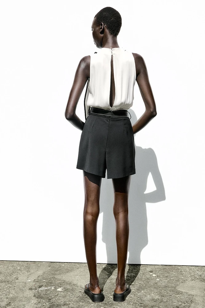BELTED COMBINATION SHORT JUMPSUIT