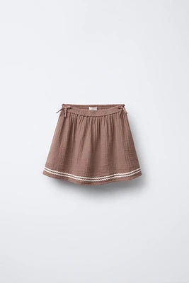 TEXTURED BOW SKORT