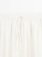 Contrast lace-trimmed skirt