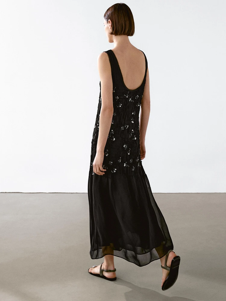 Long dress with beading