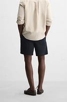 TEXTURED REGULAR FIT BERMUDA SHORTS