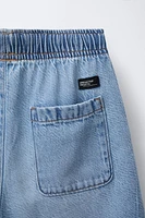BERMUDA EN DENIM CARGO AMPLE