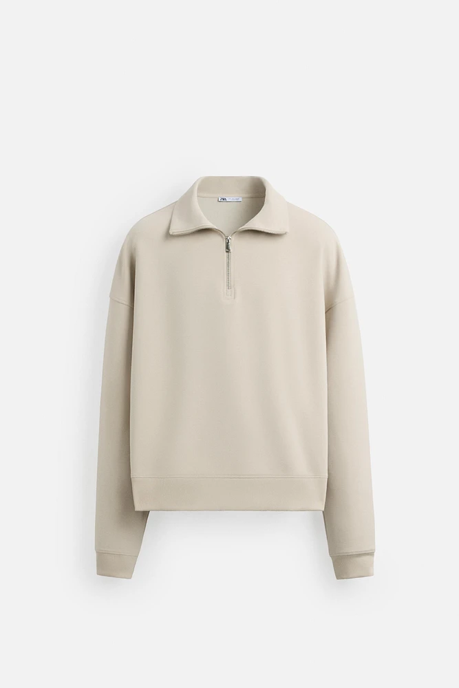 QUARTER ZIP TECHNICAL SWEATSHIRT