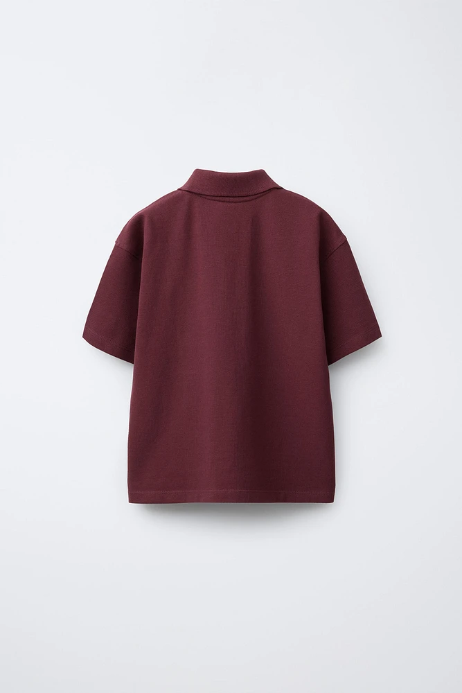 POLO BOXY FIT ÉTIQUETTE
