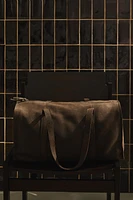 FADED LEATHER TRAVEL BAG