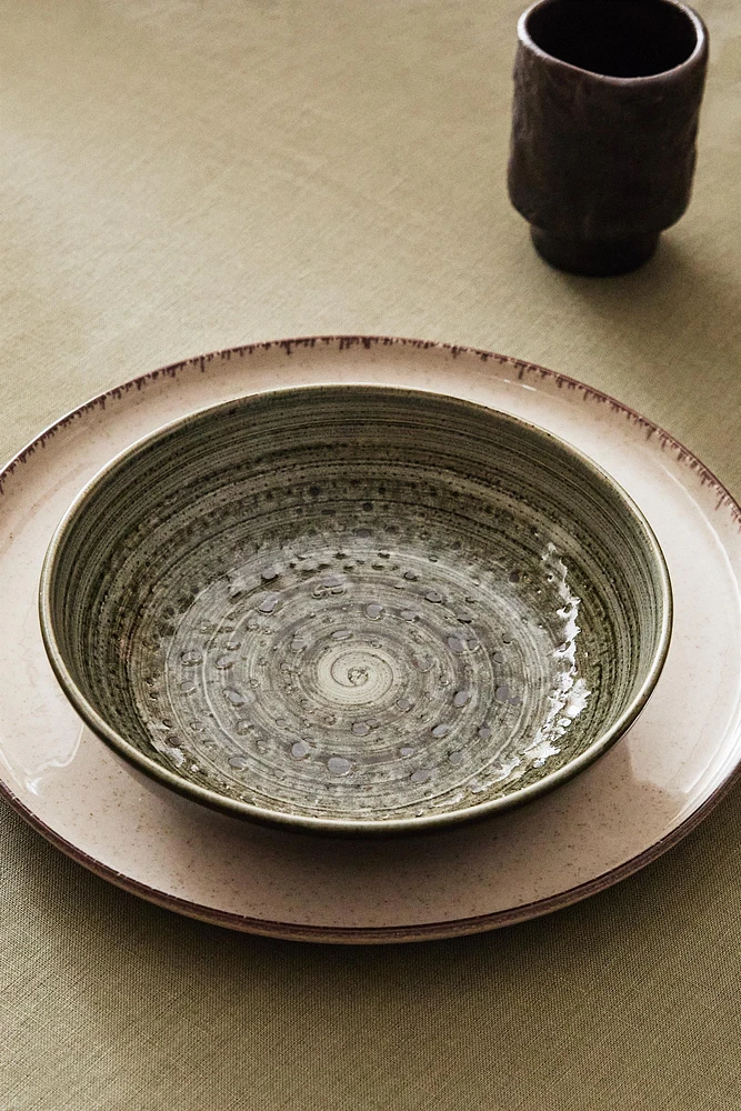 EARTHENWARE SOUP PLATE WITH SPIRAL DESIGN