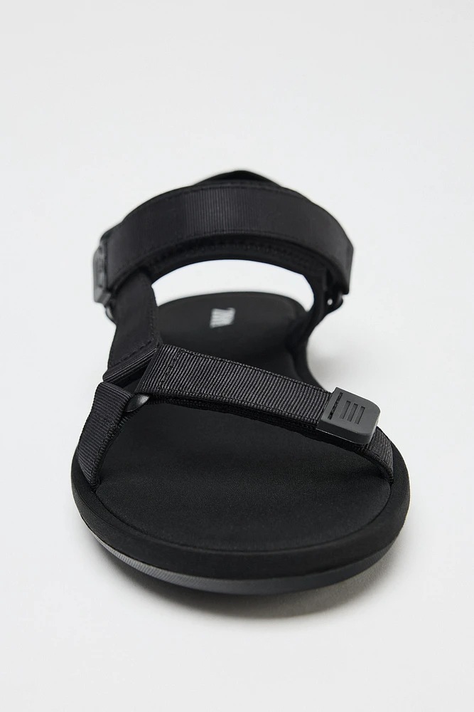 SANDALS WITH ADHESIVE STRAPS