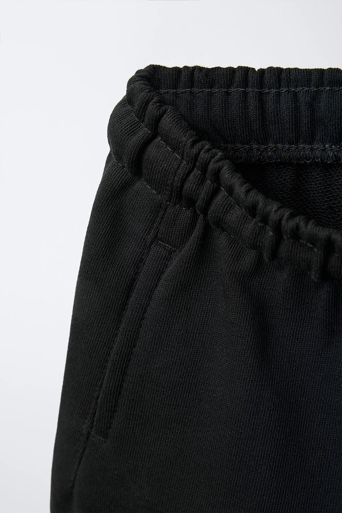 PLUSH TEXT SHORTS