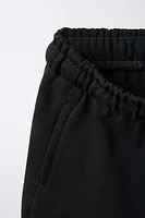 PLUSH TEXT SHORTS