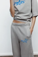 WASHED EFFECT TEXT DETAIL SWEATPANTS