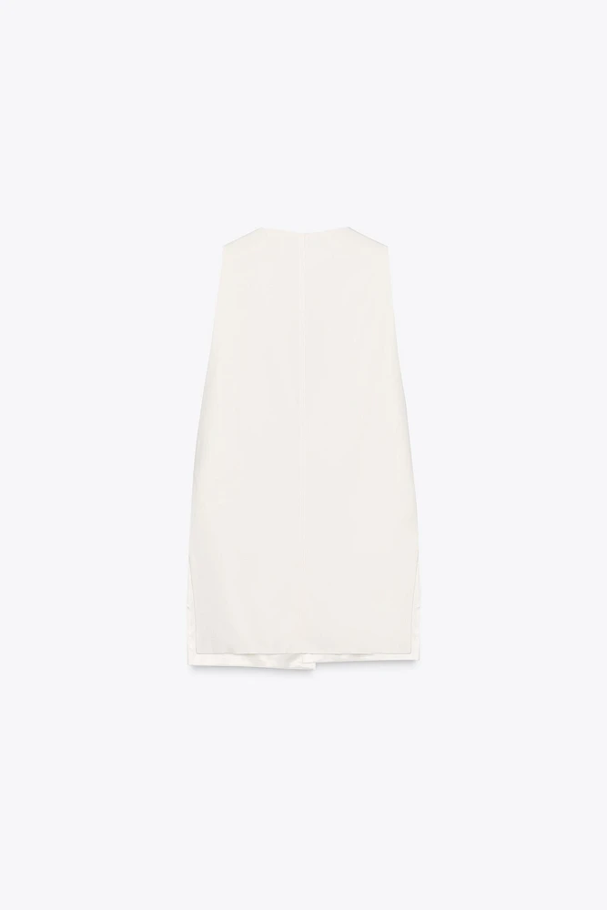 GILET LONG FENTES CEINTURE POSITIONS MULTIPLES
