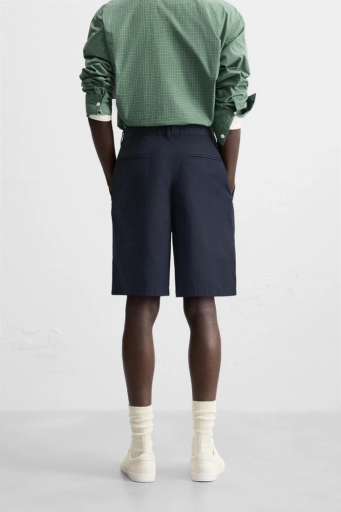 BERMUDA RELAXED FIT À PLIS