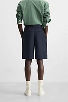 RELAXED FIT PLEATED SHORTS