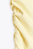 ROBE À TEXTURE AVEC PLIS