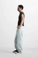 DISTRESSED FINISH BAGGY FIT JEANS