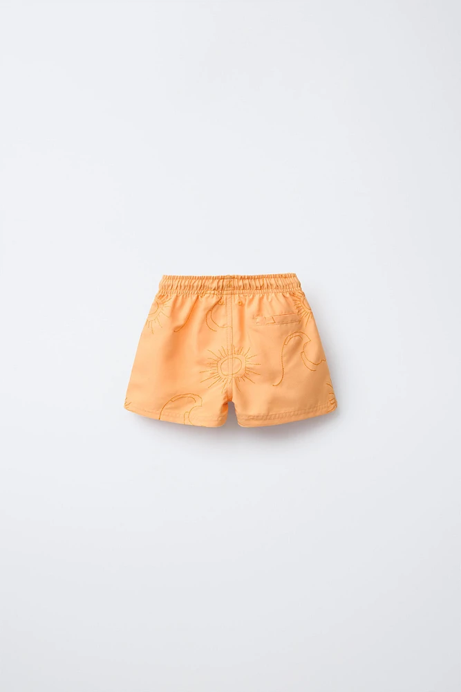 2-6 YEARS/REGULAR SWIM SHORTS WITH EMBROIDERED SUNS