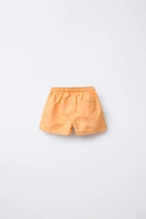 2-6 YEARS/REGULAR SWIM SHORTS WITH EMBROIDERED SUNS