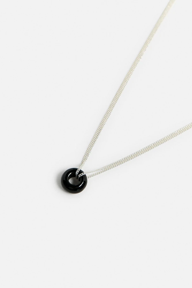 COLLIER PENDENTIF EN MATIÈRES VARIÉES