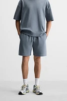 INTERLOCK STRUCTURED SHORTS