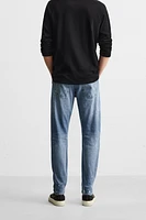 RIPPED SKINNY FIT JEANS