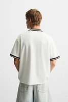 POLO JACQUARD INSCRIPTION BRODÉE