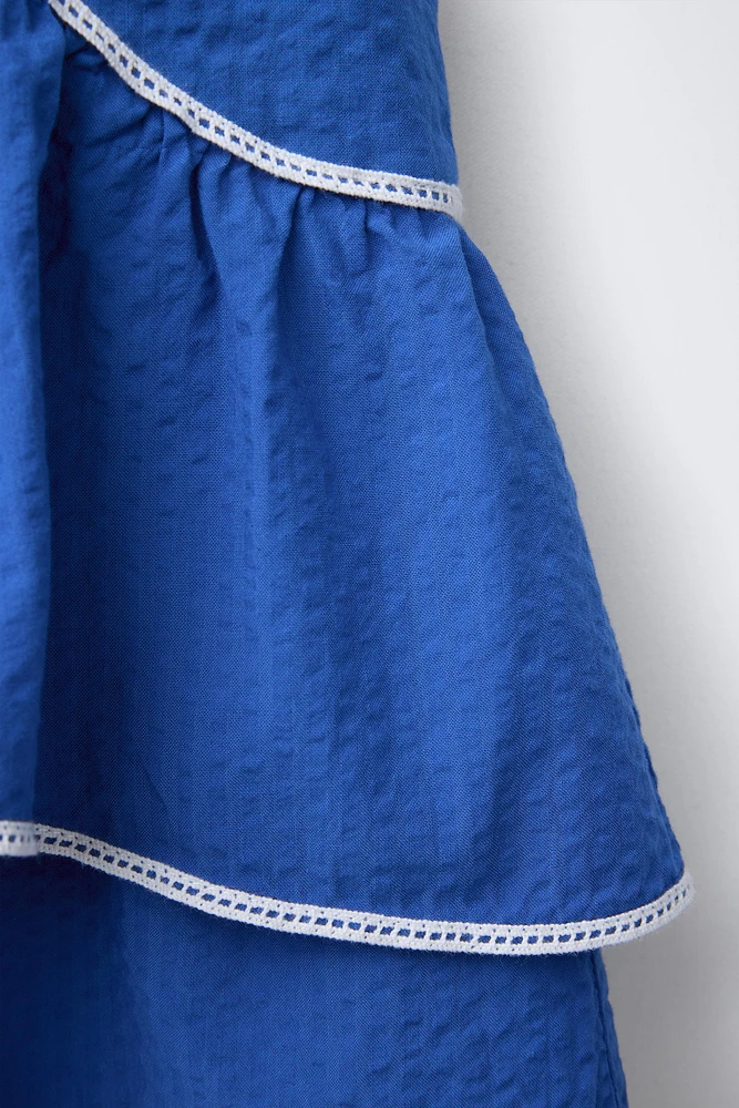 RUFFLED STITCH DETAIL TOP