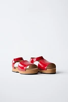 PATENT CLOGS