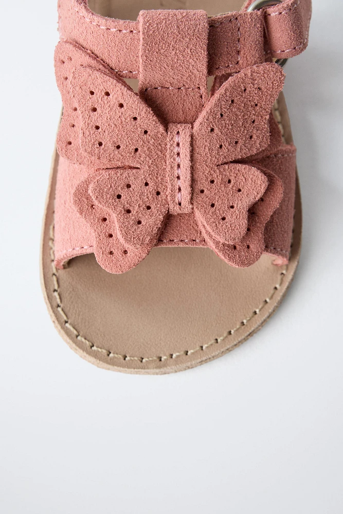 SANDALES EN CUIR PAPILLON