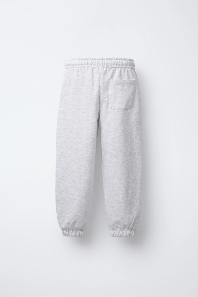 PLUSH RAISED TEXT JOGGER PANTS