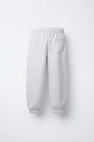 PLUSH RAISED TEXT JOGGER PANTS