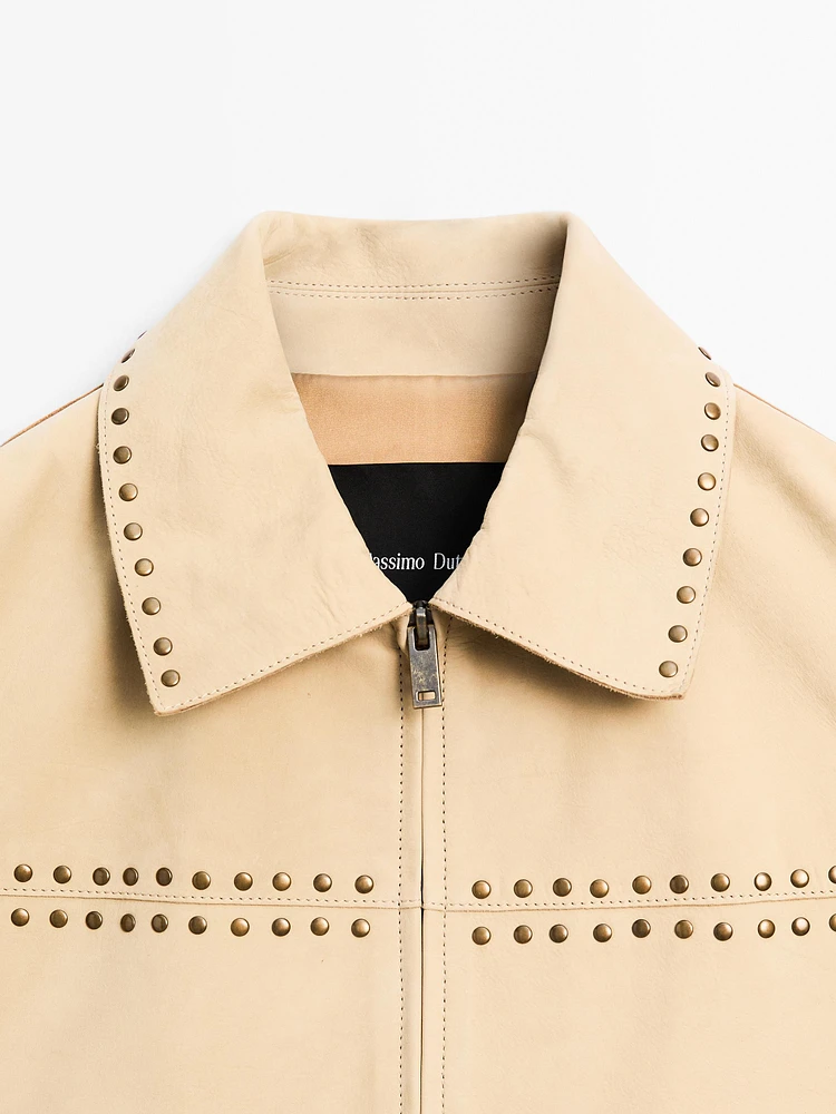 Short leather jacket with stud details