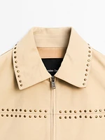 Short leather jacket with stud details