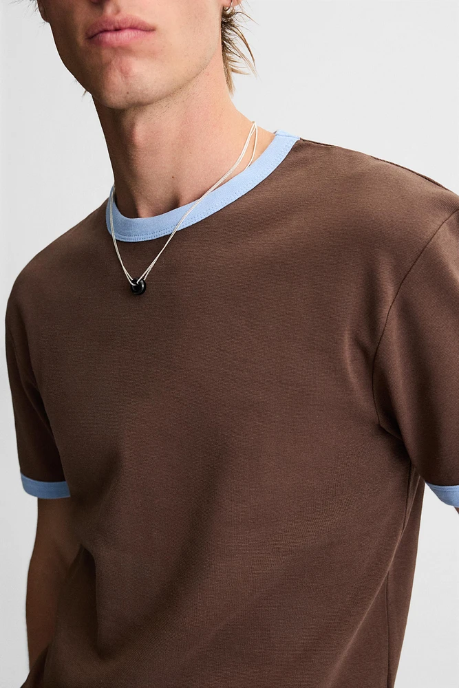 COLLIER PENDENTIF EN MATIÈRES VARIÉES