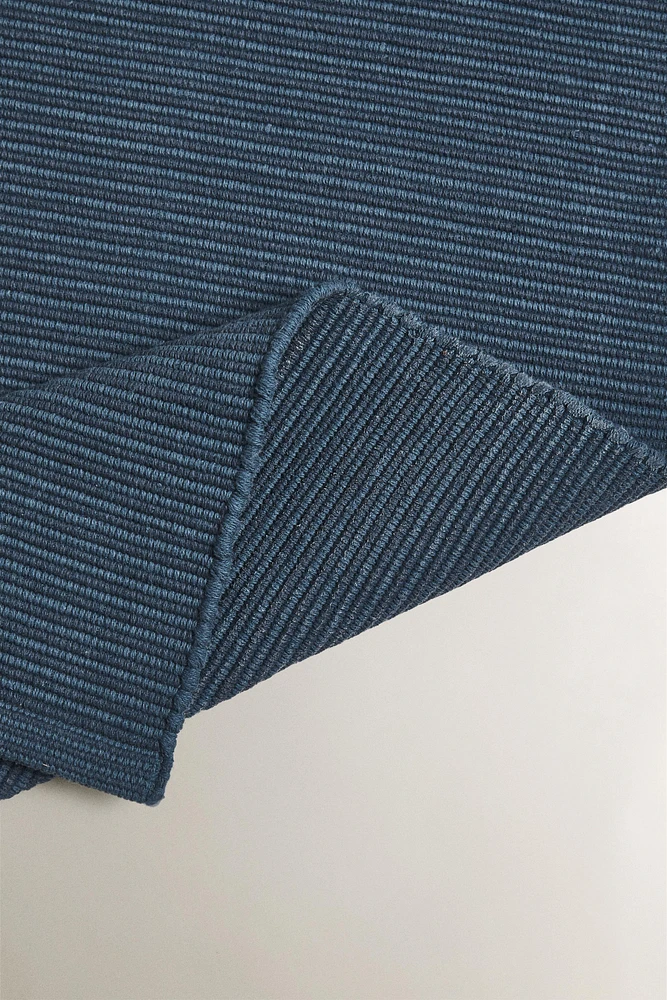 KNOTTED BATH MAT RUG