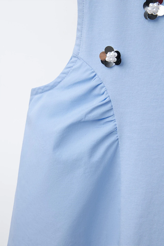 T-SHIRT EN MATIÈRES VARIÉES À FLEURS