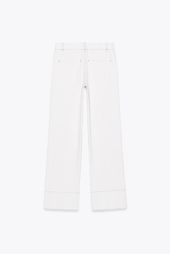 PANTALON BOOTCUT SURPIQÛRES