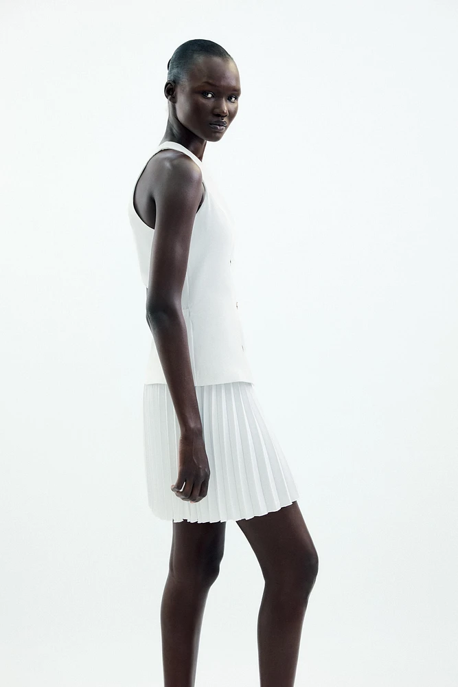 ROBE COURTE EN MATIÈRES VARIÉES