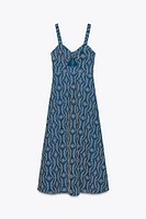 ROBE MIDI BRODERIES AJOURÉES EFFET GOMME
