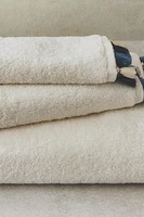 SERVIETTE DE BAIN POMPONS