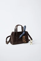 BOOT CHARM CROSSBODY BAG