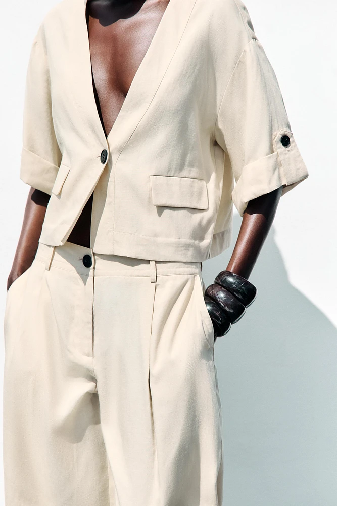 VESTE À MANCHES RETROUSSÉES